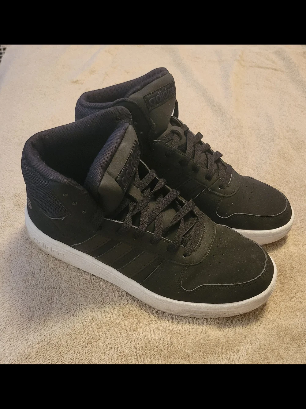adidas Men’s Black and White High-Top Sneakers
